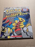 Front cover of Pokemon Deluxe Activity Book Sinnoh Edition