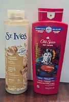 Front view of both sealed body wash bottles