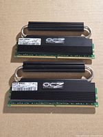Front view of both OCZ memory modules showing labels and heat-pipe design