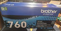 Front of sealed Brother TN760 toner cartridge box showing model and yield