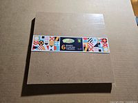 Front view of sealed pack showing label stating 6 boards
