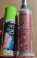 Front view of both sealed spray bottles