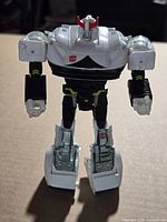 Front view of Prowl figure standing upright