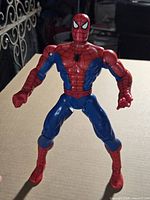 Front view of the 10" Spider-Man action figure standing upright