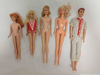 Five vintage Mattel dolls side by side