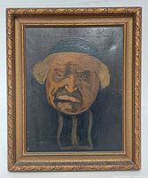 Frontal view of framed oil portrait