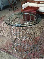 Full view of round aluminium glass end table