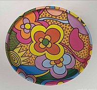 Top view of round psychedelic flower tray