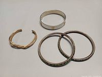 All four bracelets laid flat