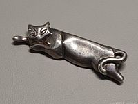 Front view of sterling silver cat brooch