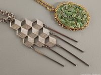 Front view of both necklaces showing Lisner hexagon pendant with bar drops and aventurine chip pendant