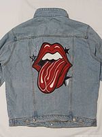 Back view showing large hand-painted Rolling Stones tongue and lips graphic
