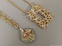 Front view of both necklaces showing pendants and chains