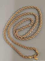 Full view of twisted rope chain laid out