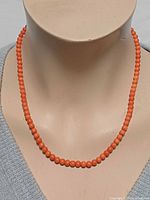 Necklace on mannequin showing full strand