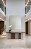 Stock photo showing similar rectangular white-framed mirror over console table