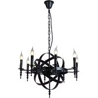 Chandelier close-up showing black wrought iron orb and six candle arms