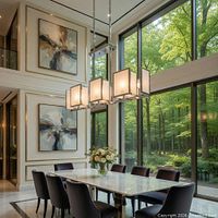 Chandelier shown over dining table, illustrating design and scale