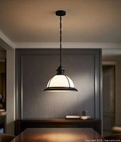 Pendant light rendered hanging over table showing design