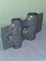 Front view showing overall form, glaze color, twin openings