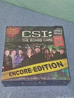 Front of sealed CSI Encore Edition board game box