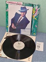 Front sleeve with vinyl record and inner sleeve