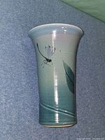 Side view of full vase showing gradient glaze, dragonfly and leaf design