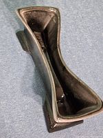 Top oblique view showing interior glaze and hourglass shape