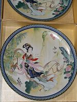 Front view of one decorative plate showing design and rim