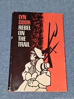 Front view of book showing dust jacket illustration and title