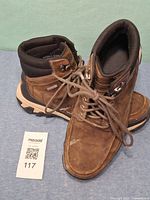 Side view of both boots showing overall design and condition