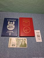 Album, book and banknote together