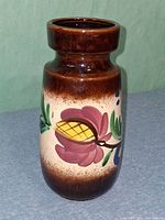 Front view showing floral design and glaze