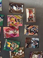 Assorted Mosaic parallels, Hog Heaven insert and base cards spread on surface