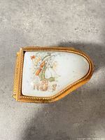 Porcelain inset lid with printed children scene on piano-shaped box