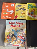 Front covers of all four hardcover children’s books