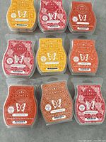 Nine Scentsy Bar wax melts arranged in three-by-three grid
