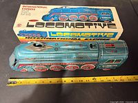 Locomotive left side with box and measuring tape