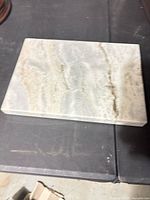 Top view of polished marble slab showing color and veining