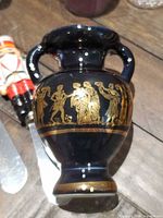 Close-up of Greek ceramic vase front view