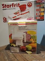 Boxes of Starfrit Easy Mandoline and Vegetable Chopper