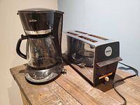 Coffee maker and toaster side by side