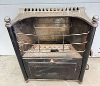 Front view of American cast iron parlor heater