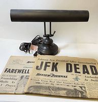 Lamp and newspapers overall view