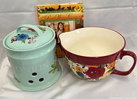Group shot of onion jar, mixing bowl and cookbook