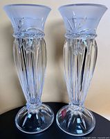 Front view of both crystal vases standing upright