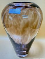 Front view of Evolution by Waterford spotted crystal vase showing sticker and swirl pattern