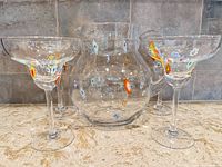 Pitcher front view with three matching margarita glasses