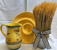 Group shot showing pitcher, platter and wheat decor