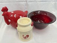 Group shot of rooster, wax warmer, and red glass bowl